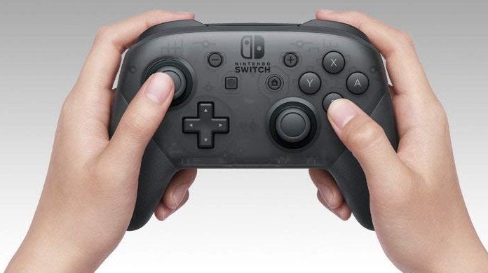 nintendo-switch-pro-controller-in-use-top nintendo-switch-pro-controller-in-use-top