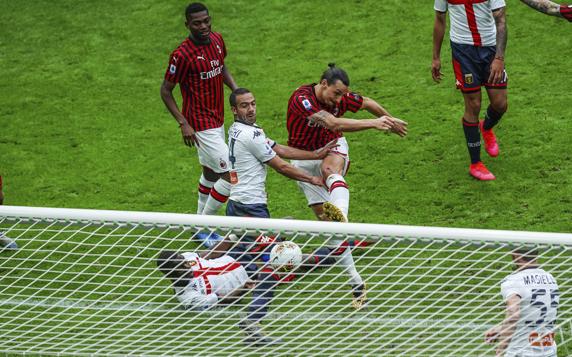 AC Milan's Zlatan Ibrahimovic scores his side's first goal during the Italian Series A match between Milan and Genoa at the San Siro stadium in Milan, Italy, Sunday, March 8, 2020. (Spada/LaPresse via AP)