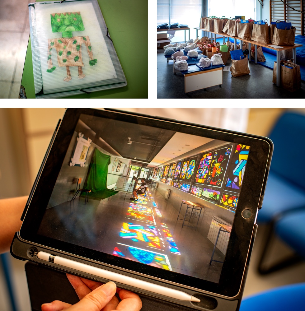 Carpeta olvidada en el colegio público Pío Xii de Madrid, trabajos del curso pasado sin recoger y una de las tabletas que se utilizan en el del instituto Cartima, en Cártama (Málaga)