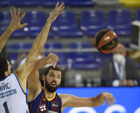 Mirotic ante Kravic. FOTO: MANEL MONTILLA