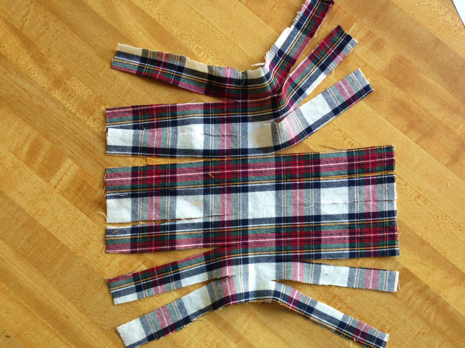 Los inicios de una borla a cuadros. 