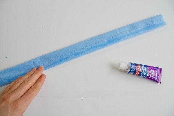 hacer un asa para la alfombra del juego de viaje