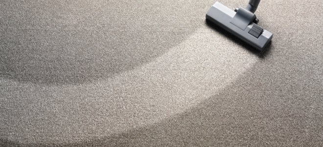 aspirar una alfombra