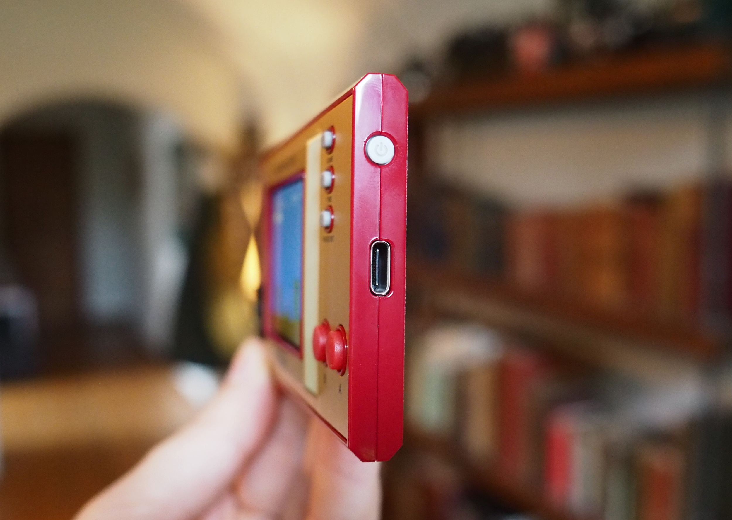 Sistema portátil de Nintendo Super Mario Bros, vista lateral