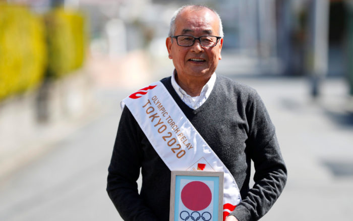 Portadores de la antorcha olímpica esperan con ansias el comienzo del relevo | Fotos