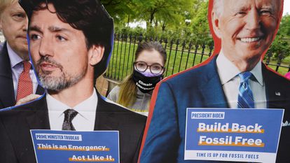 Imágenes Trudeau y Biden durante una protesta contra el cambio climático celebrada un día antes de la cumbre climática virtual celebrada en Washington el 21 de abril de 2021
