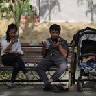 Beijing (China), 05/05/2020.- A family rests in Chaoyang Park on the last day of the Labour Day holidays in Beijing, China, 05 May 2021. The Labour Day holiday begins from 01 May to 05 May that expects to see around 265 million domestic trips during the holidays. EFE/EPA/WU HONG