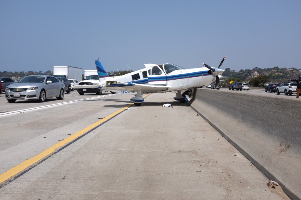 An airplane made an emergency landing on Interstate 5 near Del Mar on Tuesday, Aug. 24, 2021.