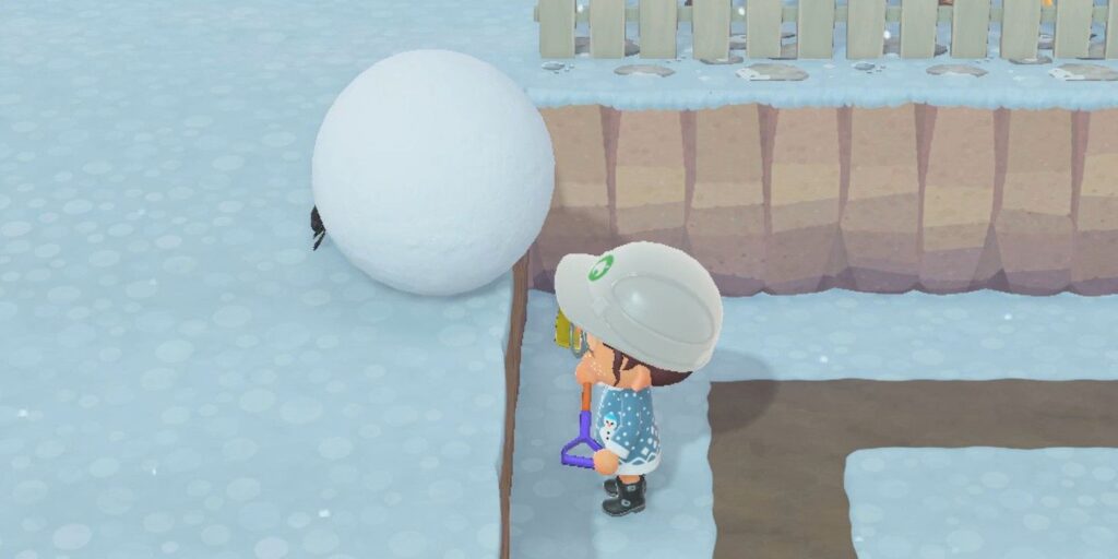 Animal Crossing Bug lanza una bola de nieve sobre la cabeza de un jugador inactivo