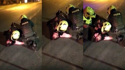 Dos policías reducen al abogado Javier Ordóñez en en barrio Santa Cecilia, en la localidad de Engativá, en el occidente de Bogotá (Colombia).