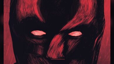 El póster de fan de Batman pinta el signo de interrogación de Riddler sobre el rostro de Bruce