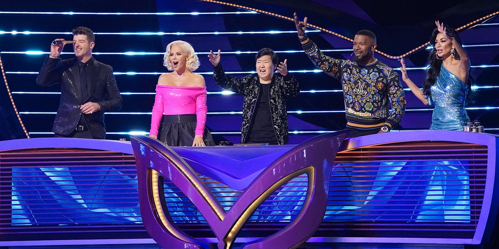 La promoción de la temporada 7 del cantante enmascarado se burla del ‘momento Bombshell’ en el episodio 2