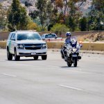 A procession is held on Friday, May 13, 2022 for a U.S. Customs and Border Protection agent who died in a car crash in Campo.