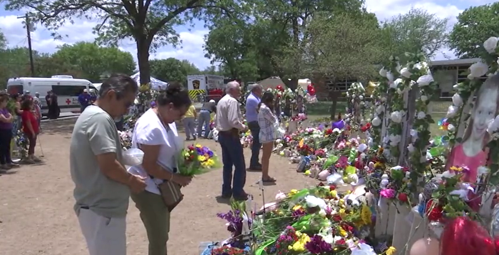 policía en polémico video de vigilancia de la matanza es marido de una maestra asesinada