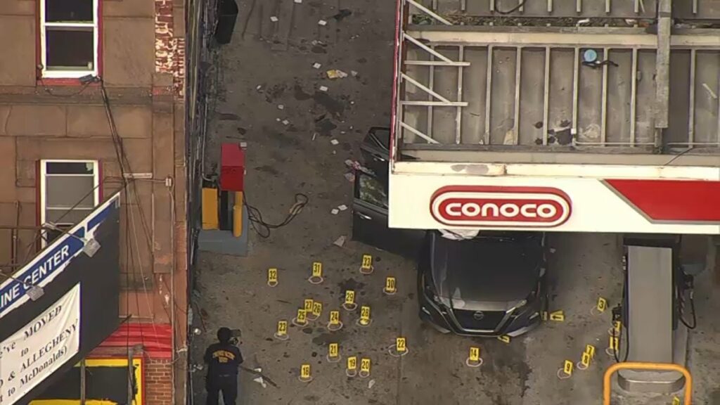 Tiroteo en gasolinera hiere de bala a niño y acaba con la vida de sujeto en Broad Street