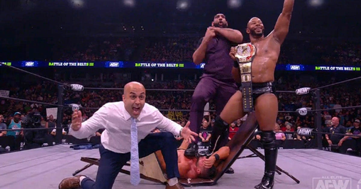 Wardlow de AEW es golpeado contra una mesa después de la victoria de Battle of the Belts 3
