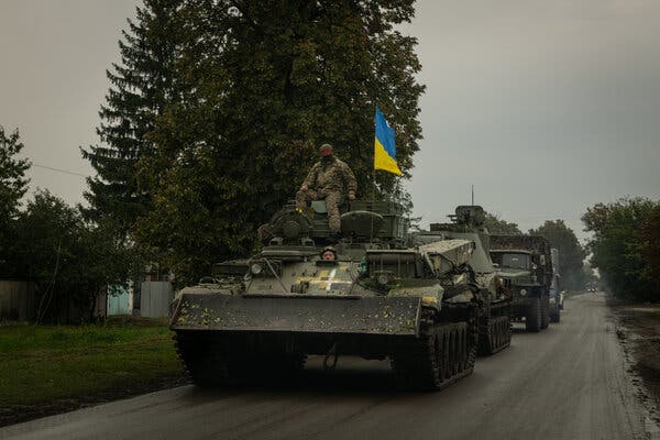 Ukrainian military vehicles driving through the recently recaptured town of Balakliya last week.