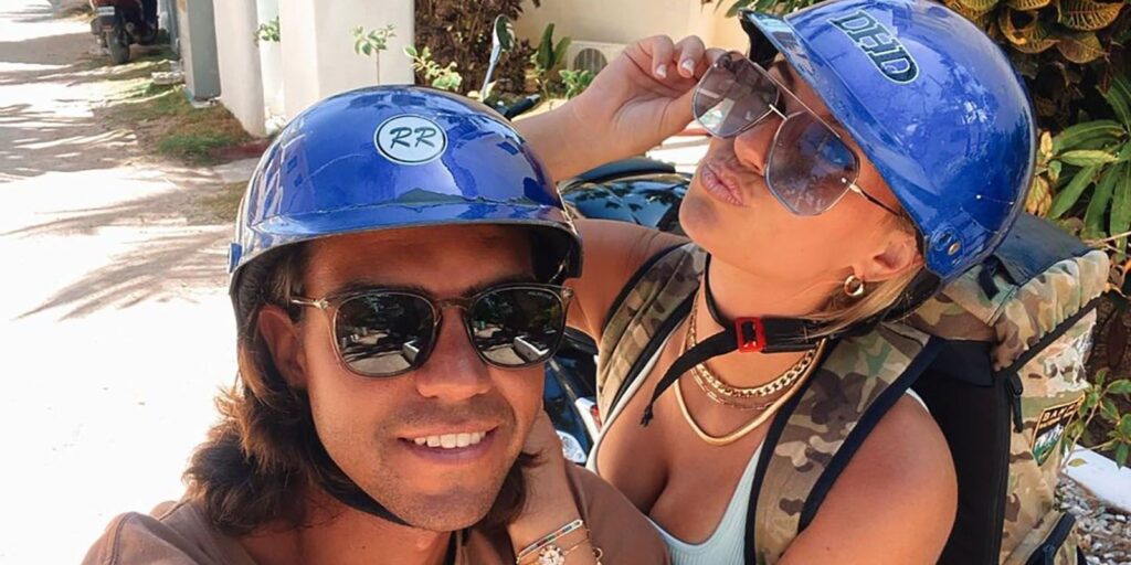 Camille Lamb Ben Willoughby below deck wearing bike helmets