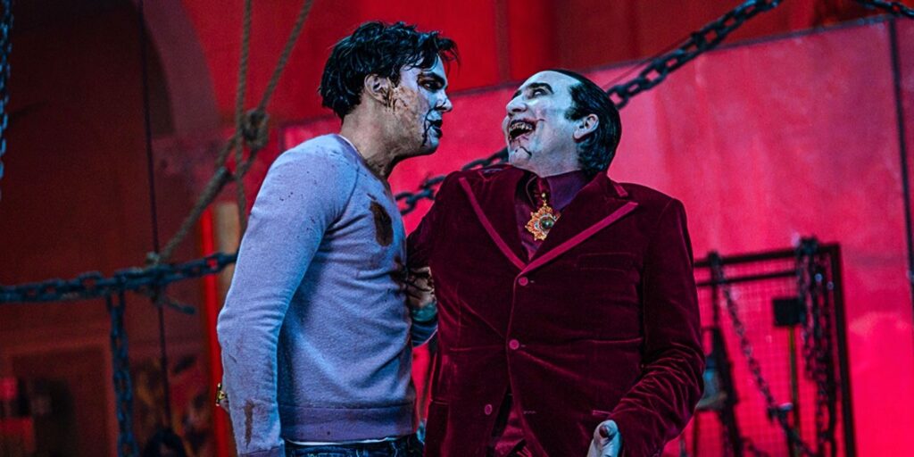 Nicholas Hoult as Renfield and Nicolas Cage as Dracula covered in blood in Universal's 2023 movie Renfield