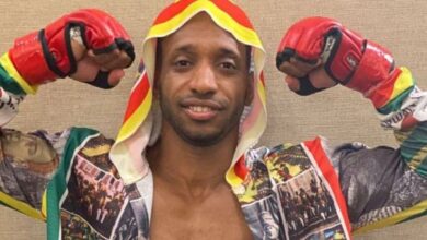 Biniyam Shibre from 90 Day Fiancé in boxing gear and arms up