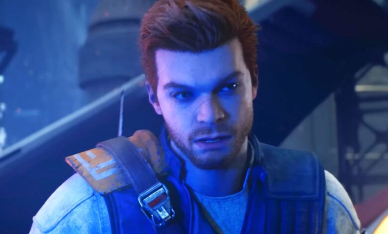 Cal Kestis in Star Wars Jedi: Survivor, illuminated by the blue light of his lightsaber.