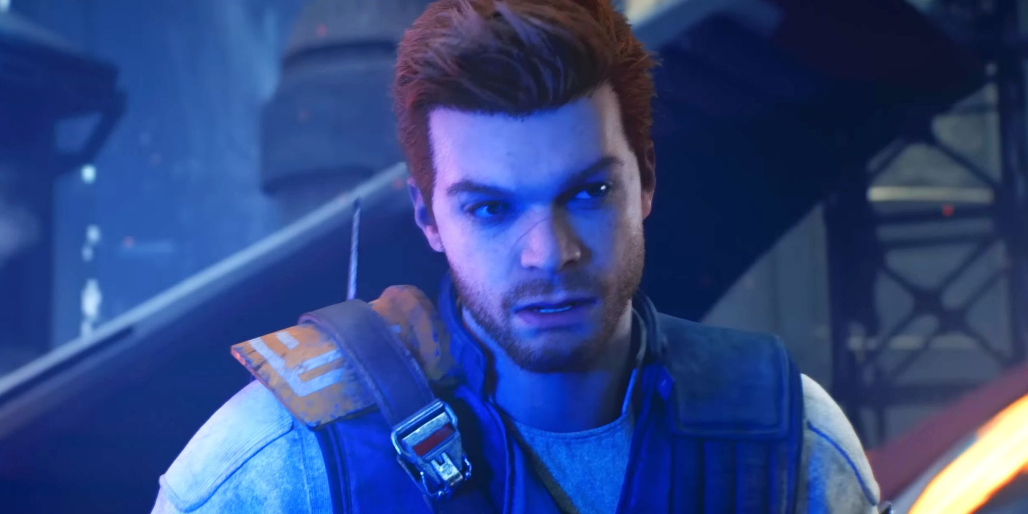 Cal Kestis in Star Wars Jedi: Survivor, illuminated by the blue light of his lightsaber.