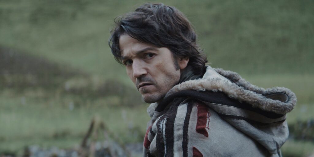 Cassian Andor on a mountain on Aldhani in Andor.