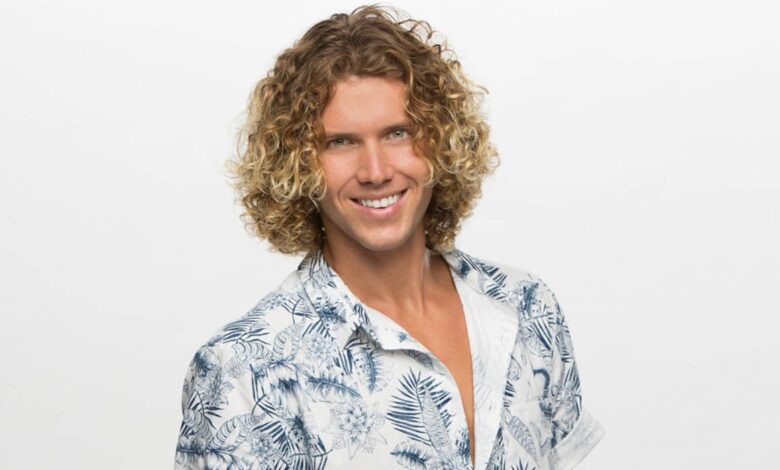 Tyler Crispen smiling for a promo photo for Big Brother