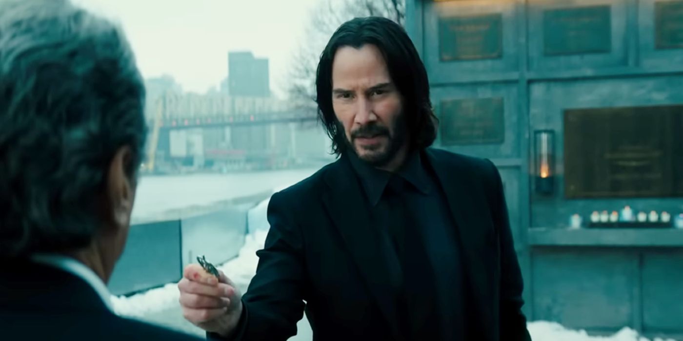 Keanu Reeves talking to Winston in John Wick 4.