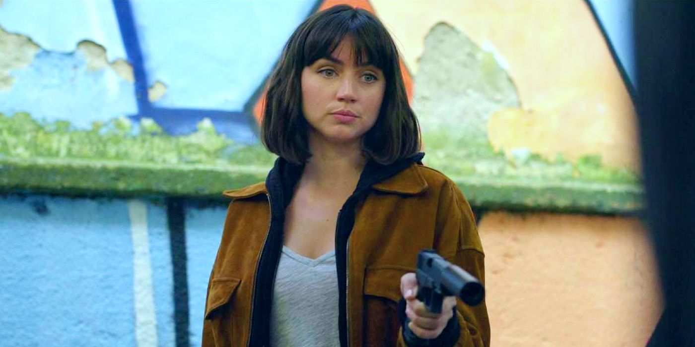 Ana de Armas pointing a gun in The Gray Man.
