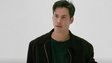 Keanu Reeves as Neo looking serious in The Matrix