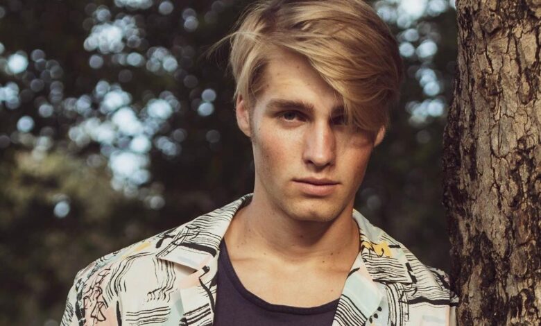 micah plath from Welcome to Plathville wearing a printed shirt