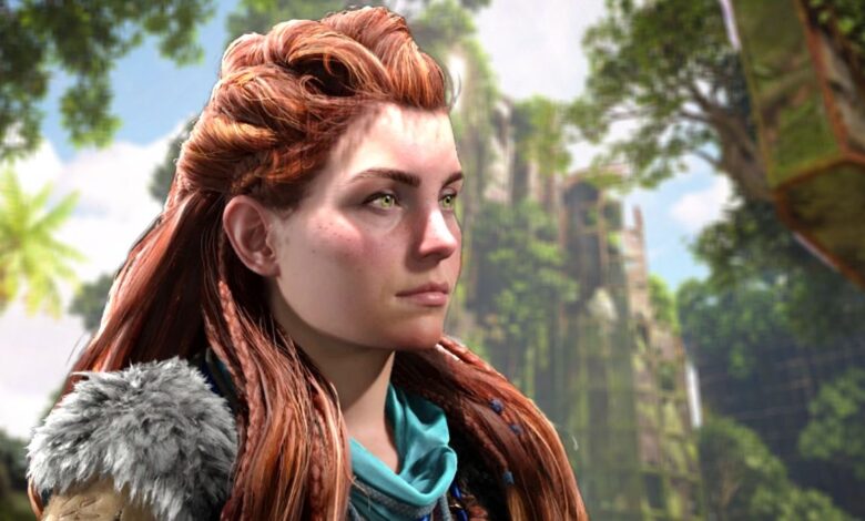A cut-out of Aloy with a neutral expression behind a blurred image of a dilapidated, overgrown structure in Horizon Forbidden West Burning Shores.