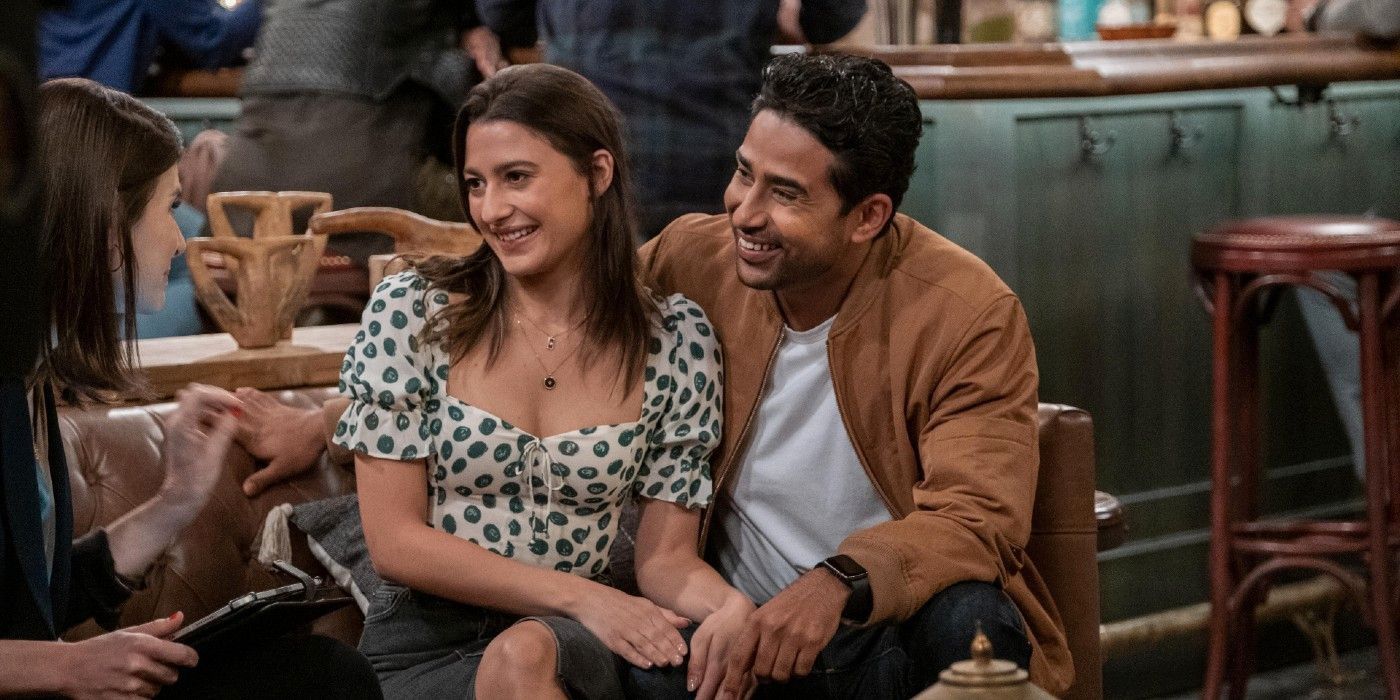 Sid and Hannah from How I Met Your Father sitting together in a bar, talking to a wedding planner.