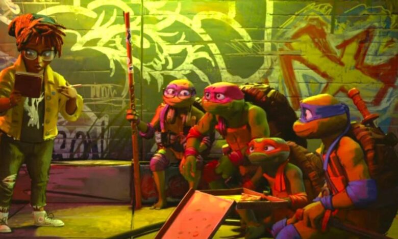 Teenage Mutant Ninja Turtles Mutant Mayhem still featuring April O'Neill standing while the Turtles look at her