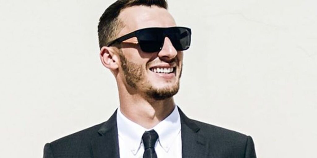 Alexei Brovarnik From 90 Day Fiancé wearing sunglasses