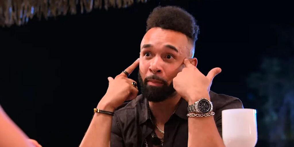 Bartise Bowden from Perfect Match with fingers at sides of head