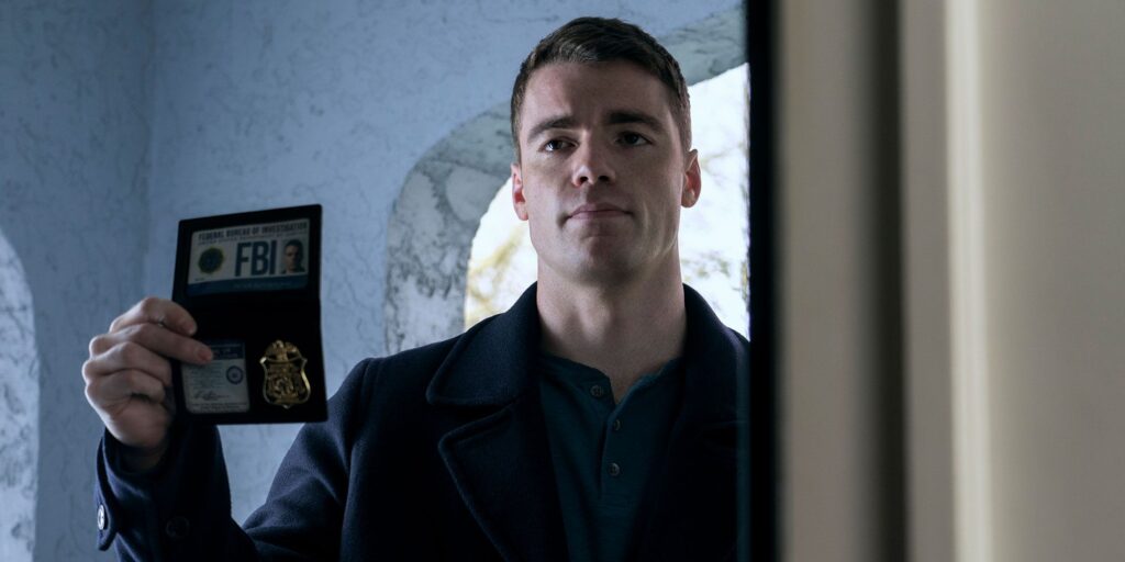 Peter pulls out his FBI badge in The Night Agent