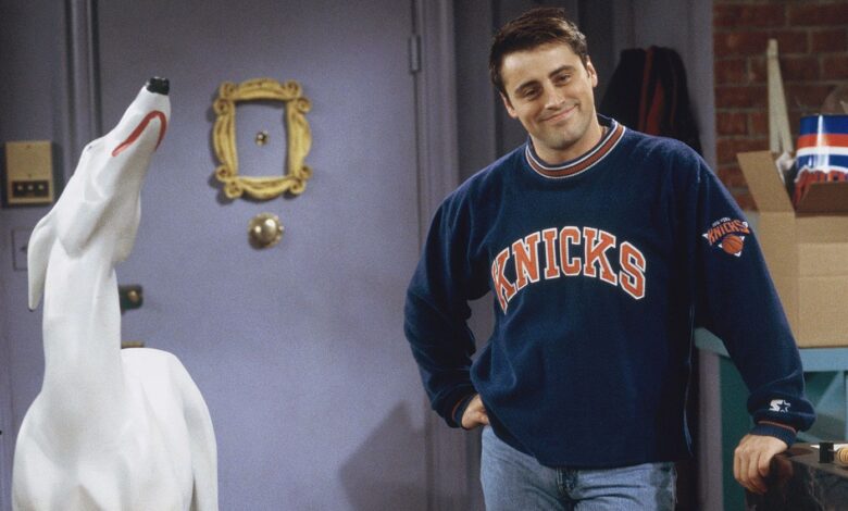 Joey with his dog statue in Friends