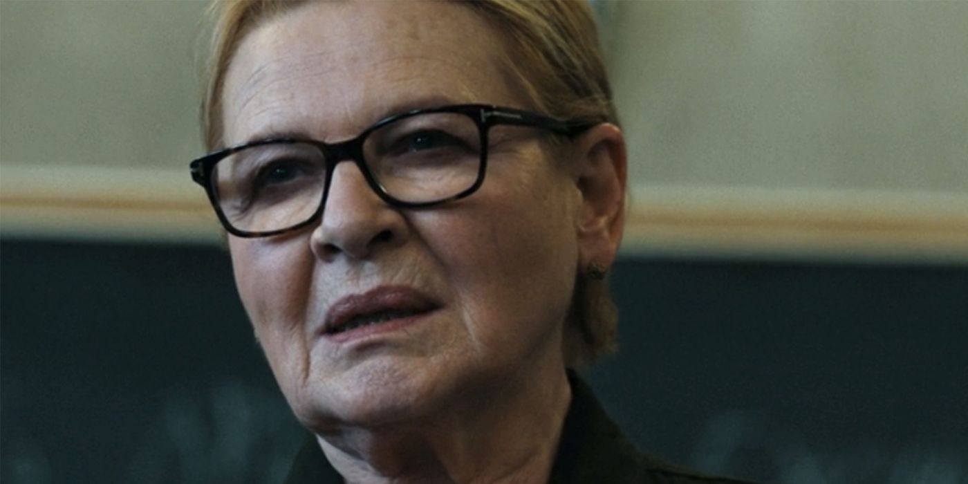 Mayor of Kingstown's Miriam in front of a chalk board.