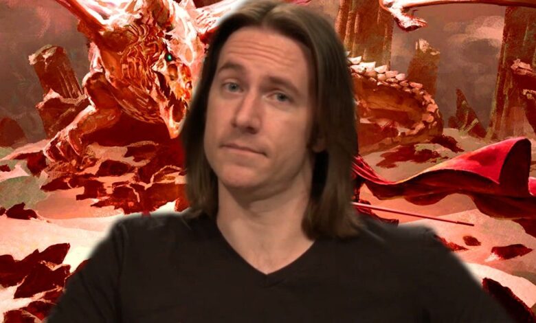 Matt Mercer sitting in front of D&D artwork of a dragon