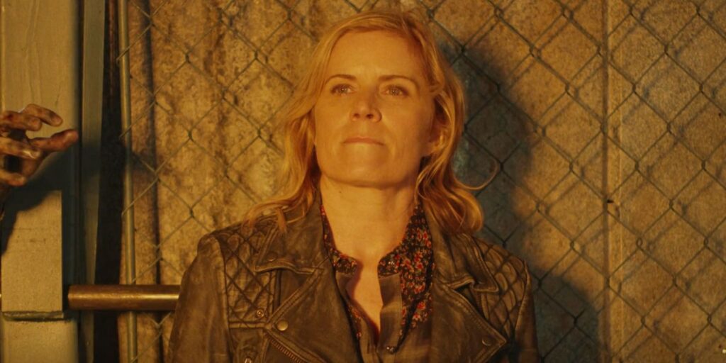 Madison overlooking the stadium fire in Fear the Walking Dead Season 4 Episode 8