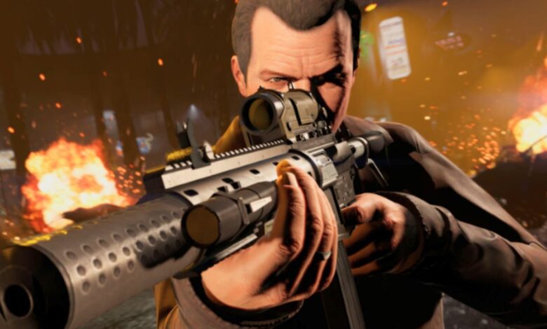 GTA 5's Michael aiming down the sights of a scoped gun as fire blazes on in the background.