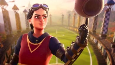 A female Quidditch player wearing a Gryffindor uniform and balancing a Quaffle on her finger with the Quidditch pitch from Harry Potter: Quidditch Champions in the background.