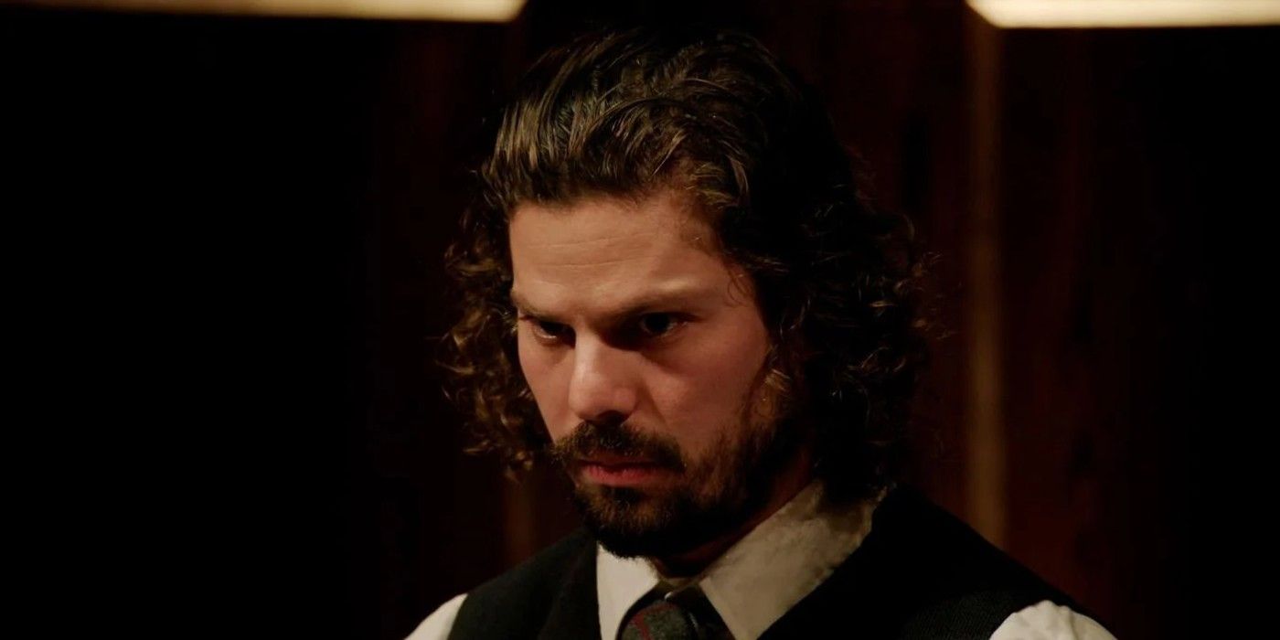 Christian de la Torre The Traitors looking down dark background