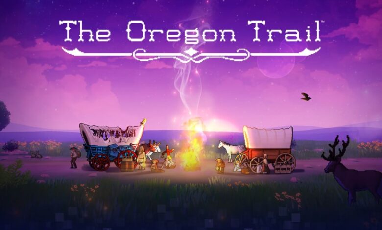 The Oregon Trail video game cover art, showing two covered wagons and a group of migrants surrounding a campfire at dusk.