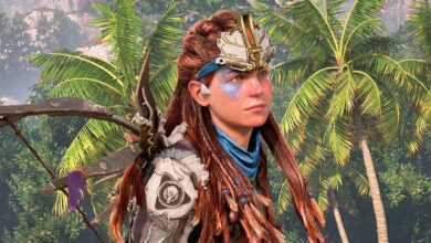 Aloy standing among palm trees in Horizon Forbidden West.