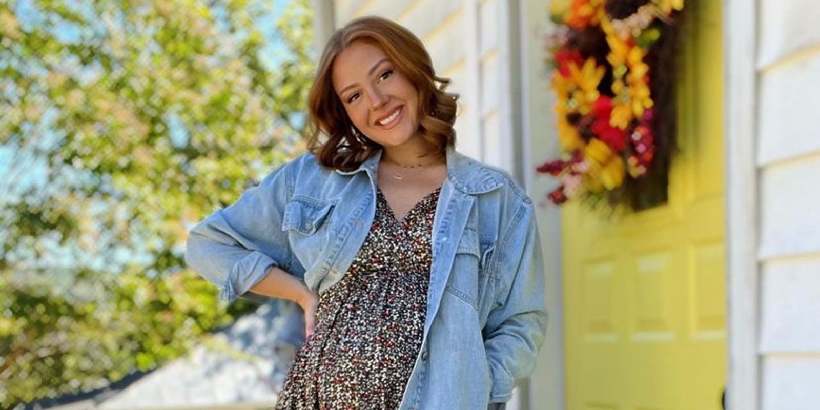 Kara Bass Rojer from 90 Day Fiancé season 9 posing outside in front of yellow door