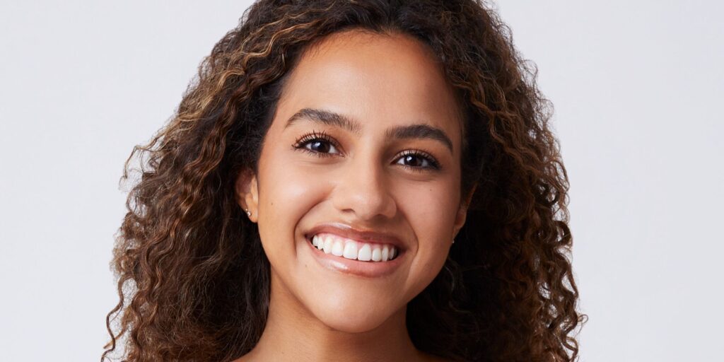 Teddi Wright on The Bachelor season 26 posing against white background