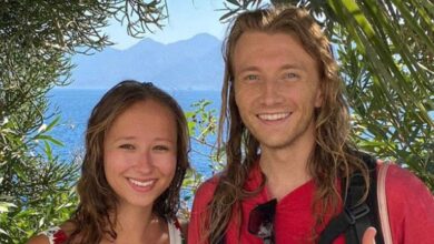 Steven and Alina Johnston from 90 Day Fiancé The Other Way smiling for a photo outside